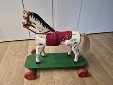 Holzpferd auf Rollen